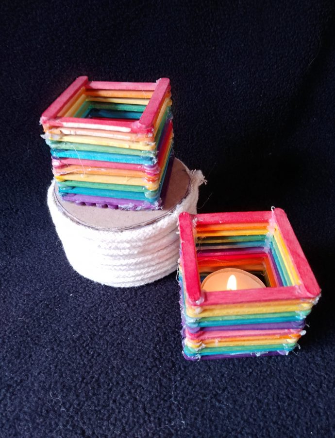 Popsicle stick candle holders.